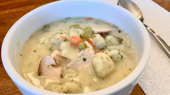 Bowl of bbq chicken Dumpling Soup